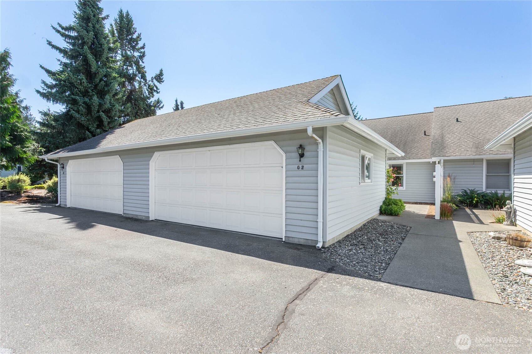 1843 Main Street, Unit G2 Lynden, WA 98264 - Photo 2 of 30 a view of a house with a garage