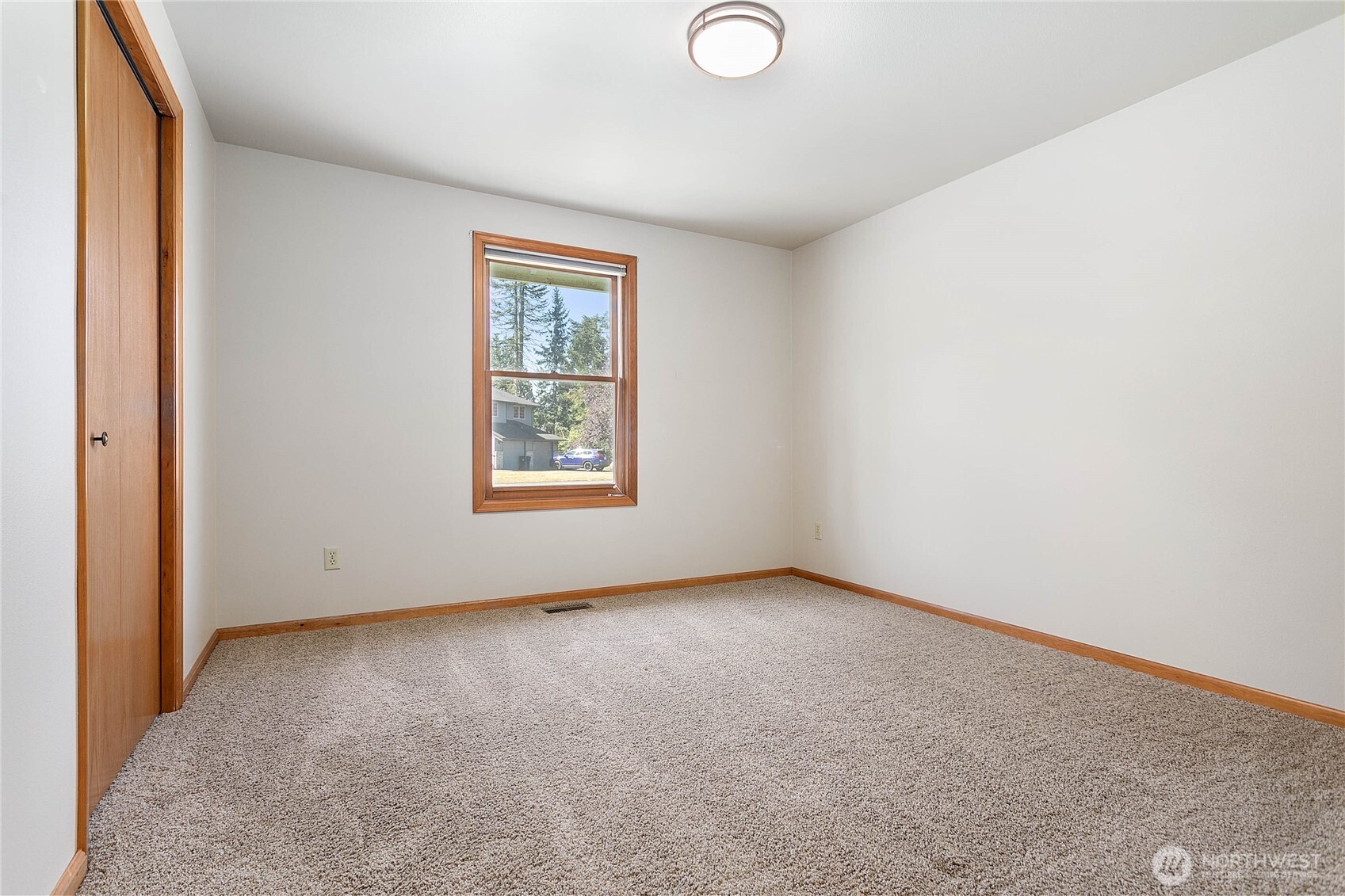 1843 Main Street, Unit G2 Lynden, WA 98264 - Photo 21 of 30 an empty room with windows