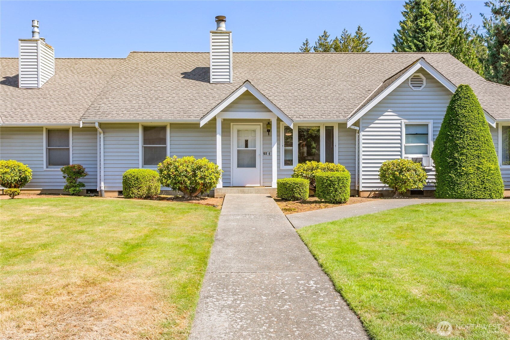 1843 Main Street, Unit G2 Lynden, WA 98264 - Photo 26 of 30 a view of a house with back yard