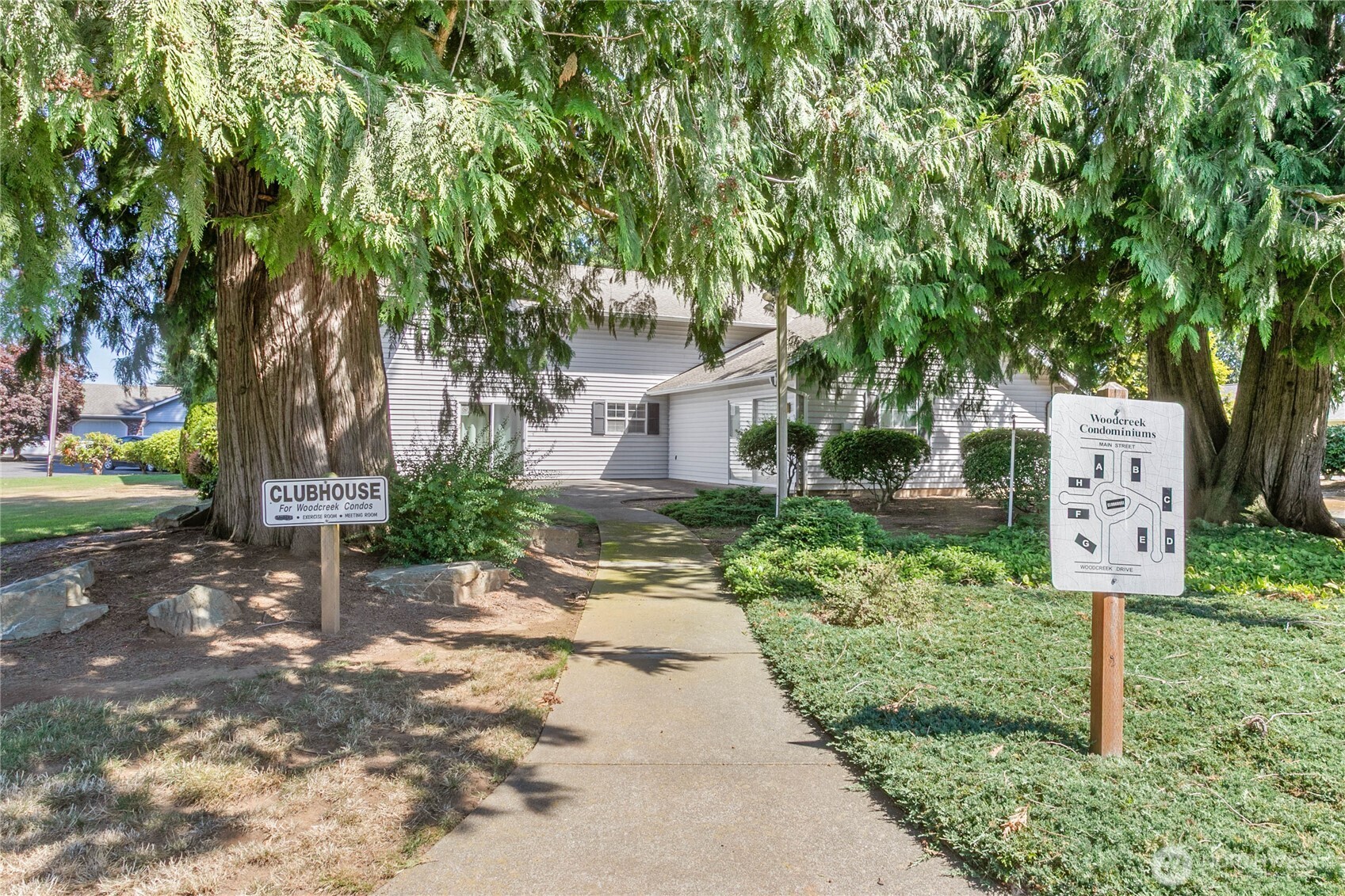 1843 Main Street, Unit G2 Lynden, WA 98264 - Photo 29 of 30 a sign board with yard in front of it