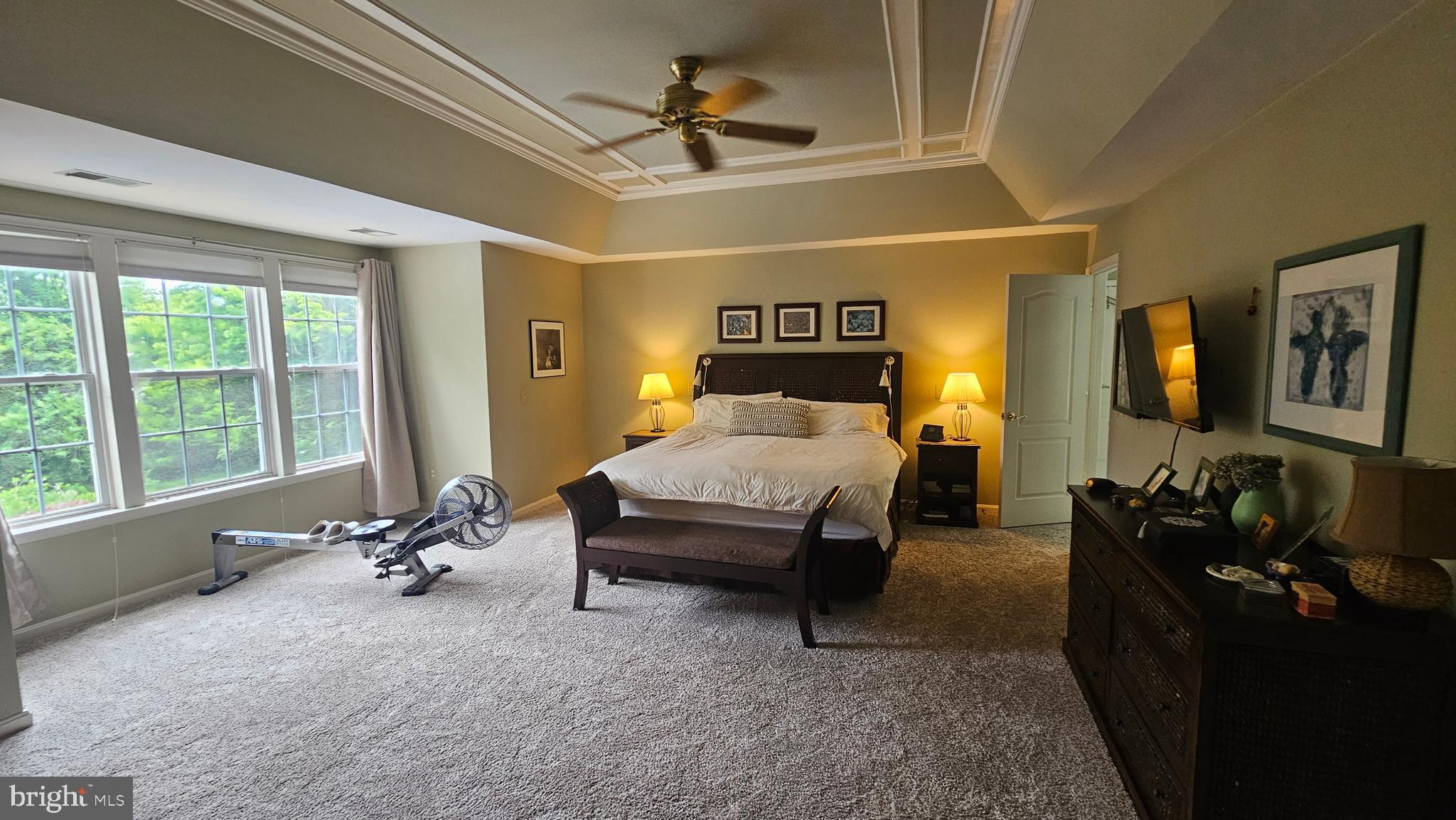 6107 Traceys Overlook Road Tracys Landing, MD 20779 - Photo 25 of 67 a bedroom with furniture and large windows