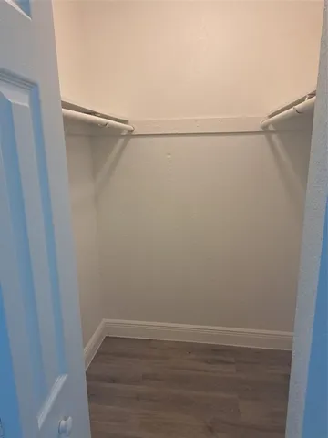 a bathroom with a toilet and a bathtub