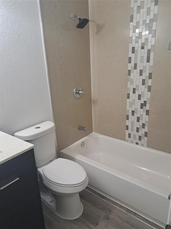 980 Southwest 76th Avenue, Unit 3 Pompano Beach, FL 33068 - Photo 19 of 32 a bathroom with a toilet and a bathtub