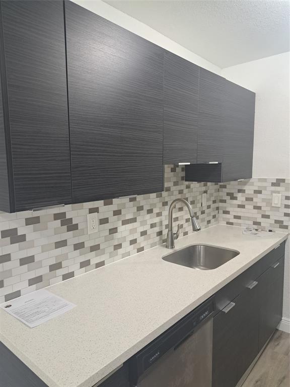 980 Southwest 76th Avenue, Unit 3 Pompano Beach, FL 33068 - Photo 2 of 32 a bathroom with a sink and a mirror