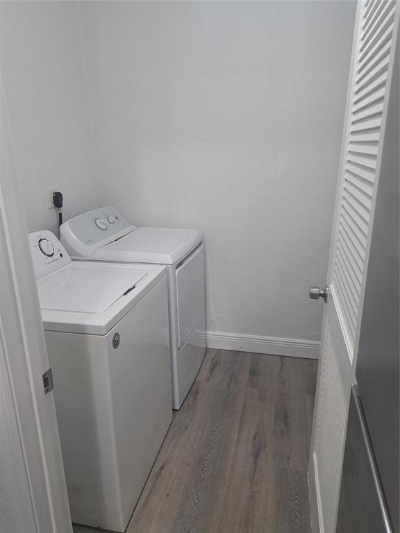 980 Southwest 76th Avenue, Unit 3 Pompano Beach, FL 33068 - Photo 9 of 32 a utility room with dryer and washer