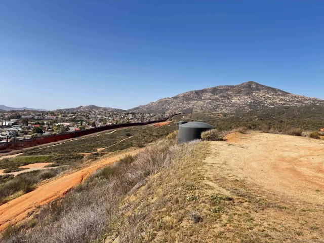 a bathroom with a shower and a mirror