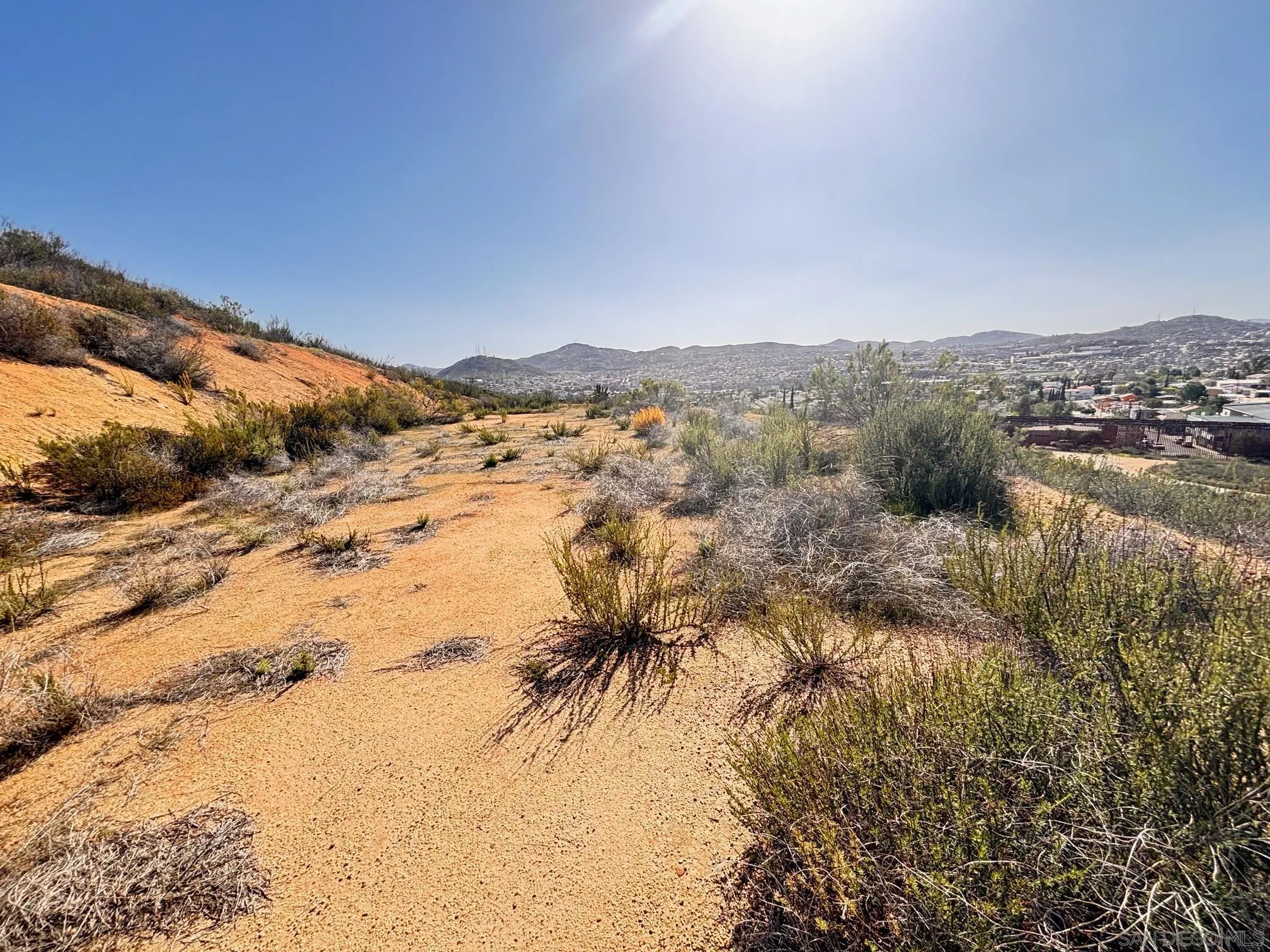 23833 Tecate Mission Road Tecate, CA 91980 - Photo 4 of 13 a view of a lake with mountains in the background