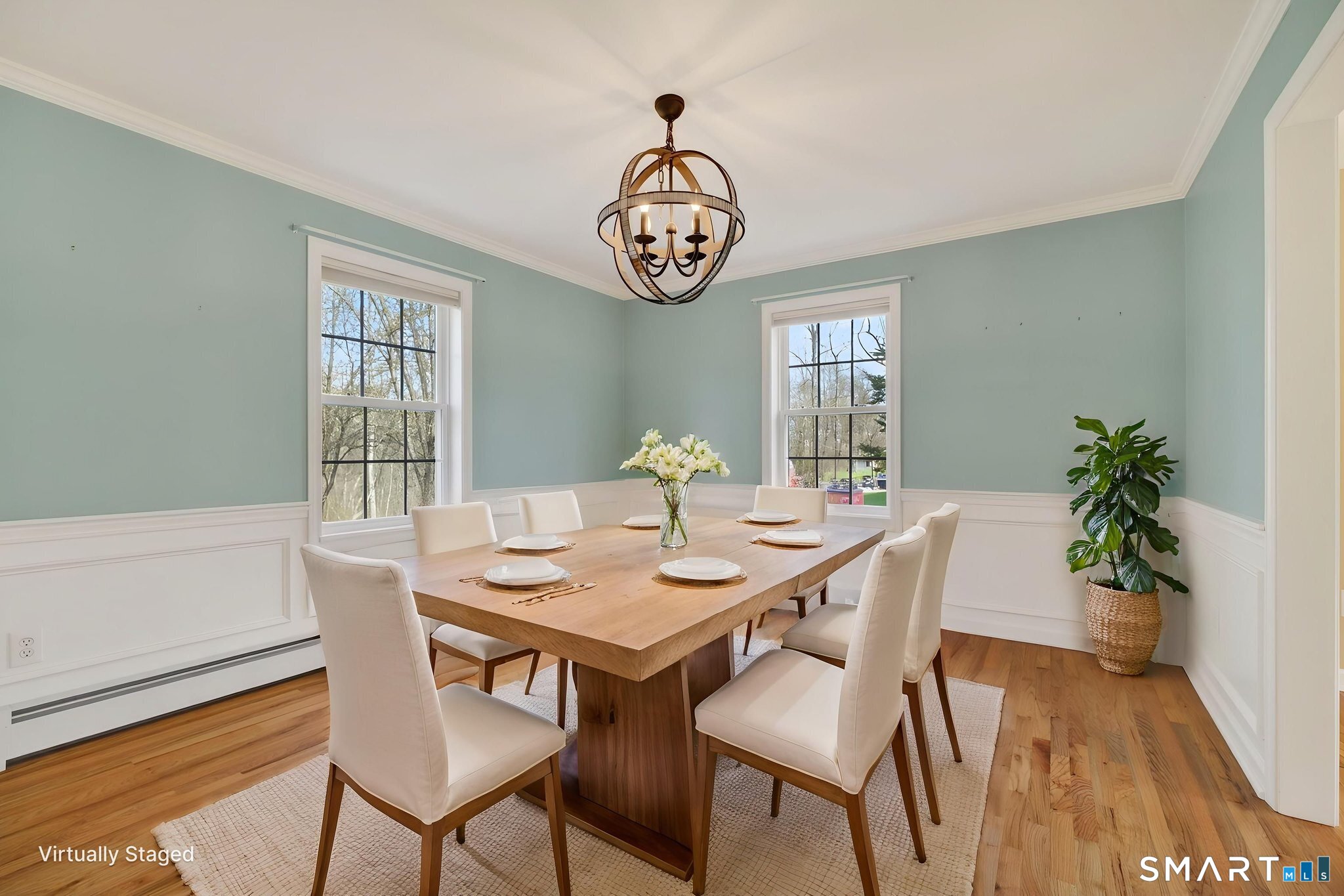 12 Stonewall Lane Clinton, CT 06413 - Photo 13 of 32 a view of a dining room with furniture window and wooden floor