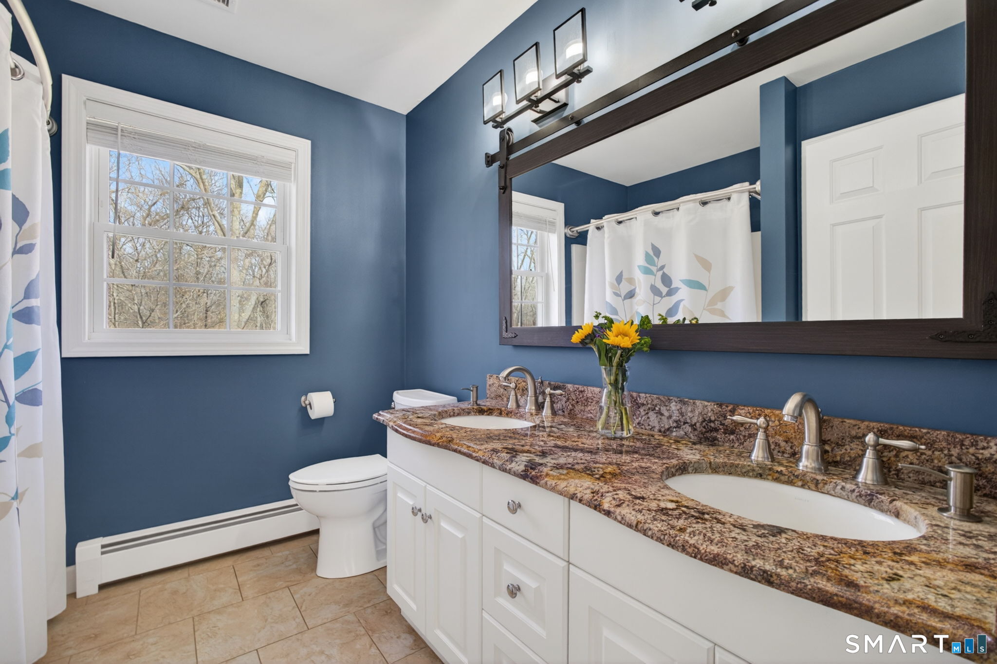 12 Stonewall Lane Clinton, CT 06413 - Photo 18 of 32 a bathroom with a granite countertop sink vanity mirror and toilet