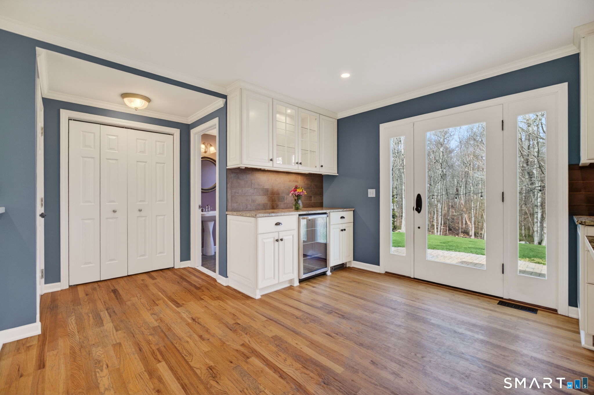 12 Stonewall Lane Clinton, CT 06413 - Photo 7 of 32 a view of a kitchen with wooden floor and a window