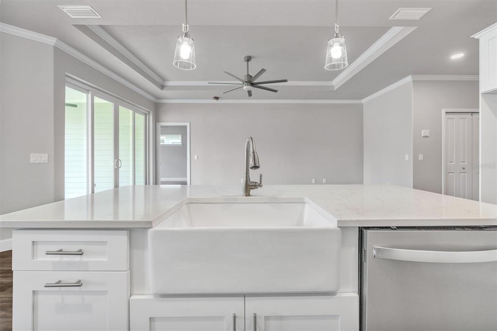 1140 Southwest 67th Street Gainesville, FL 32607 - Photo 23 of 65 a bathroom with a sink a vanity and a mirror