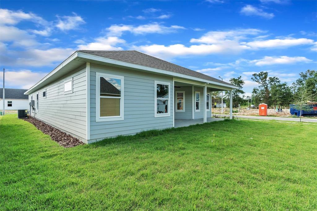 1140 Southwest 67th Street Gainesville, FL 32607 - Photo 53 of 65 a view of a house with a backyard