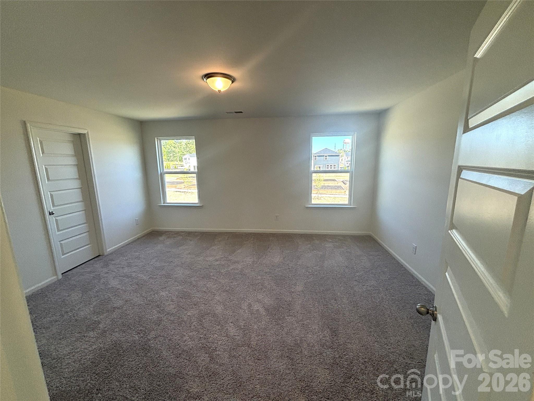 357 Roxanna Lane, Unit 72 York, SC 29745 - Photo 12 of 23 a view of empty room with windows