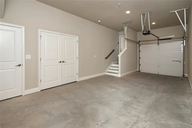 a view of a house with swimming pool and sitting area