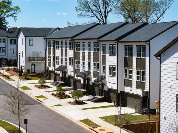 a black and white photo of a street