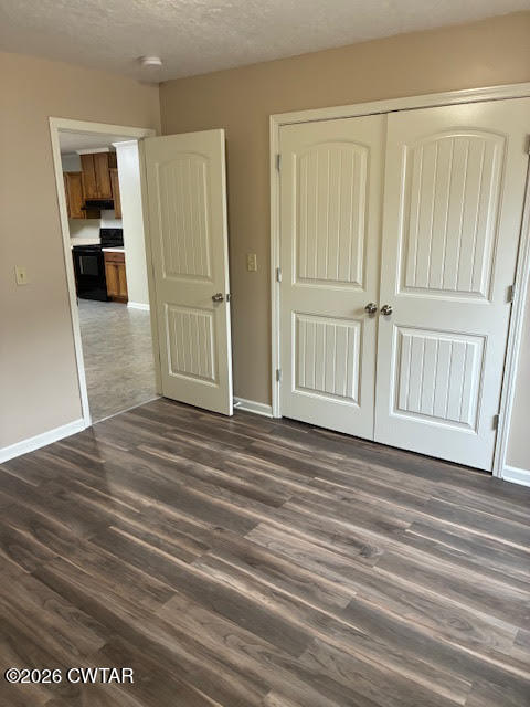 482 Main Street Friendship, TN 38034 - Photo 23 of 27 an empty room with wooden floor closet and windows