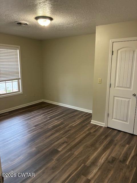 482 Main Street Friendship, TN 38034 - Photo 25 of 27 an empty room with wooden floor and windows