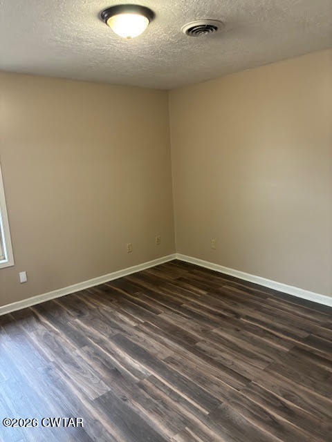 482 Main Street Friendship, TN 38034 - Photo 26 of 27 a view of a room with wooden floor and white walls