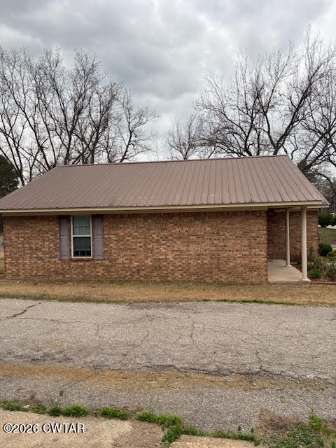 482 Main Street Friendship, TN 38034 - Photo 7 of 27 a front view of a house with a yard
