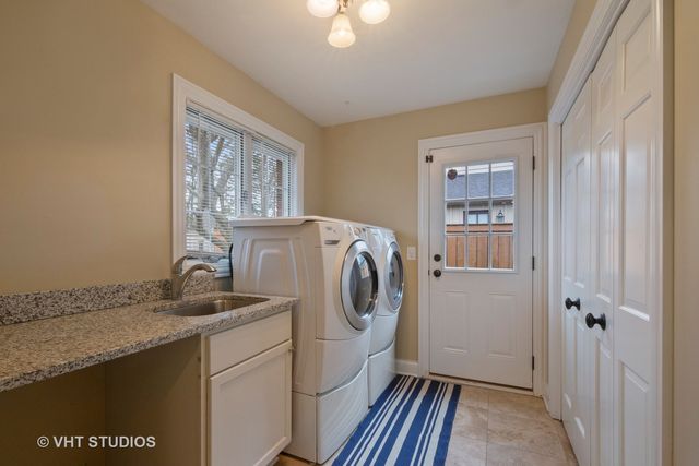 a utility room with dryer and washer