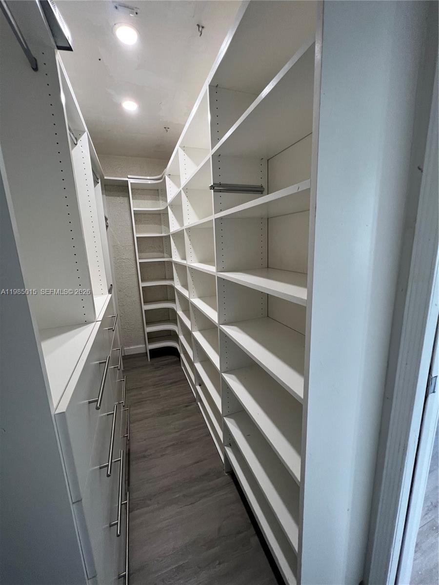 5730 Southwest 55th Street Davie, FL 33314 - Photo 13 of 34 a view of an empty walk in closet