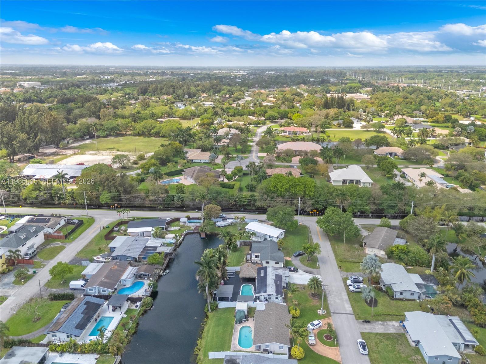 5730 Southwest 55th Street Davie, FL 33314 - Photo 27 of 34 an aerial view of residential houses with outdoor space and ocean view