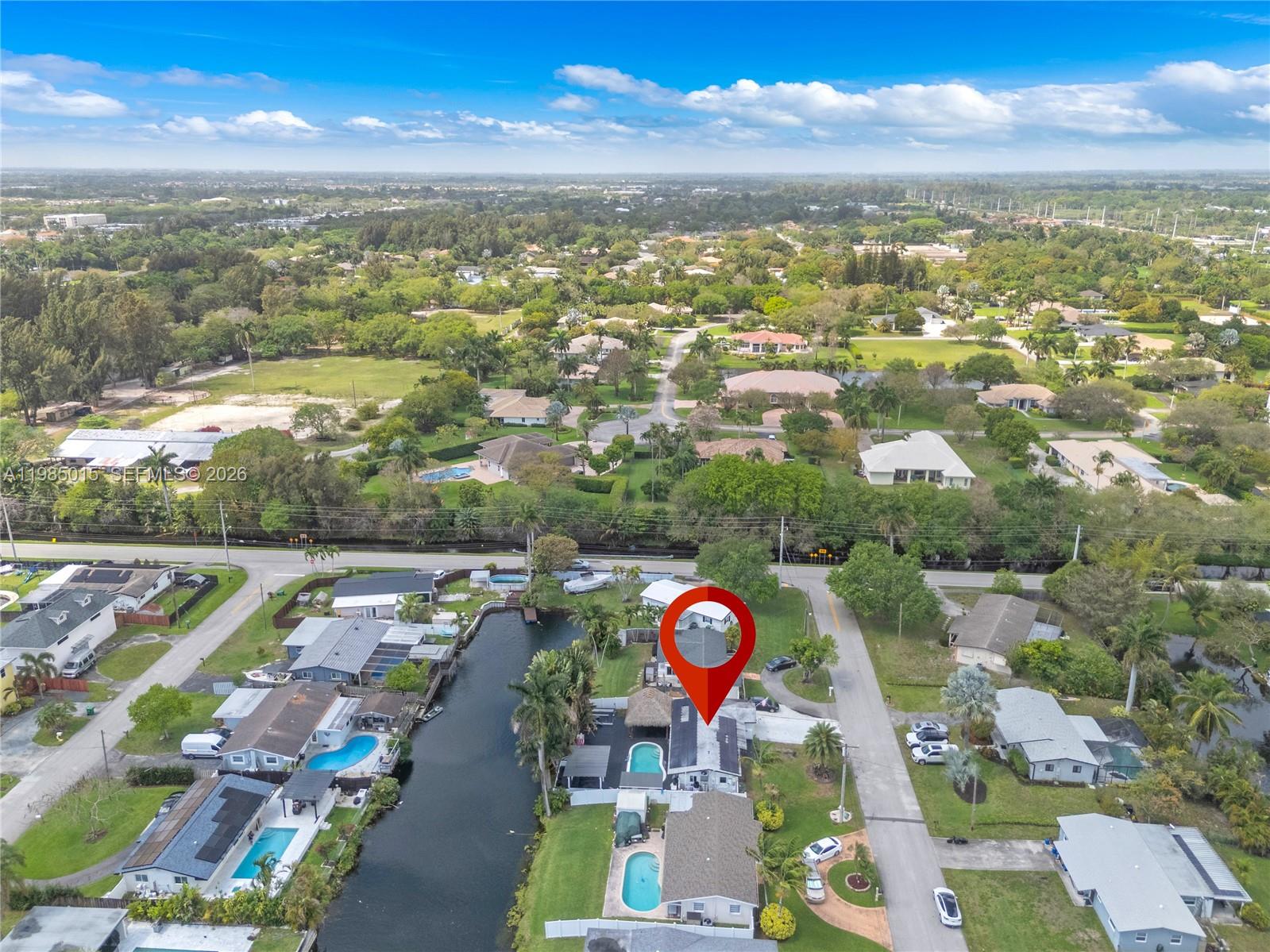 5730 Southwest 55th Street Davie, FL 33314 - Photo 28 of 34 an aerial view of residential houses with outdoor space and ocean view