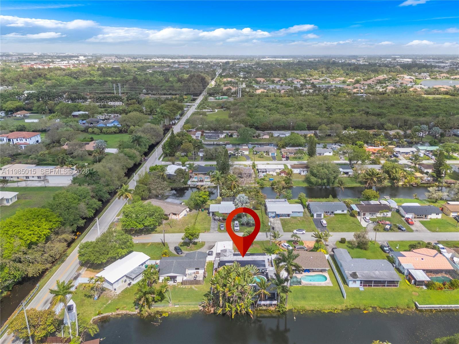 5730 Southwest 55th Street Davie, FL 33314 - Photo 29 of 34 an aerial view of residential building and lake