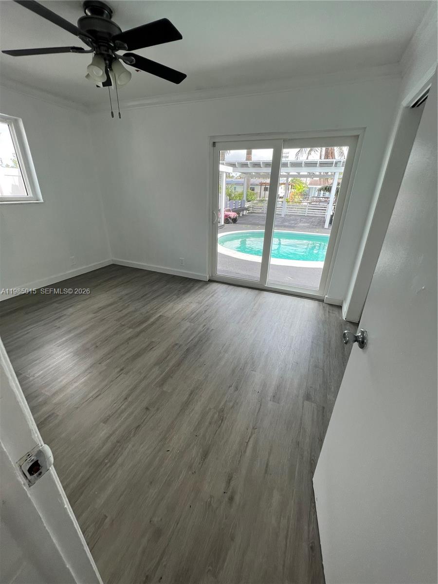 5730 Southwest 55th Street Davie, FL 33314 - Photo 8 of 34 an empty room with windows