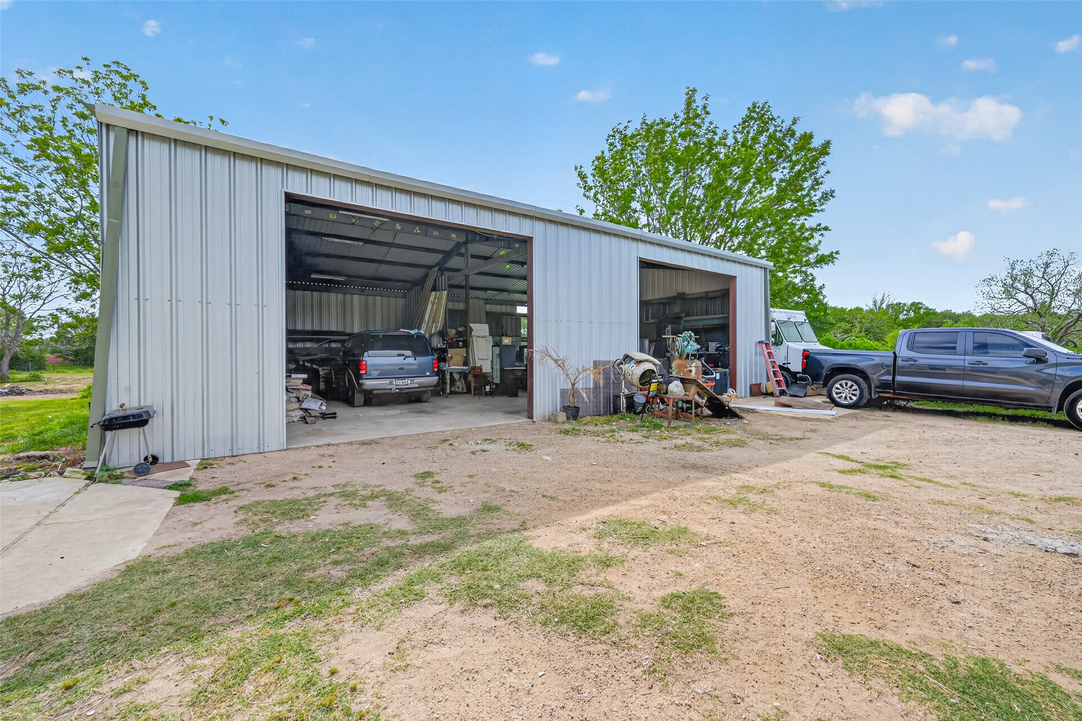 8023 Pool Hill Road Fulshear, TX 77441 - Photo 42 of 50 a view of a children toys back of the house