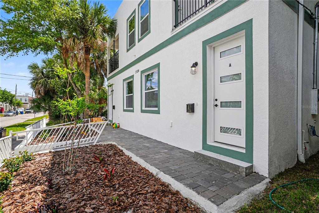 2328 West Spruce Street, Unit A Tampa, FL 33607 - Photo 15 of 15 a view of a house with a bench