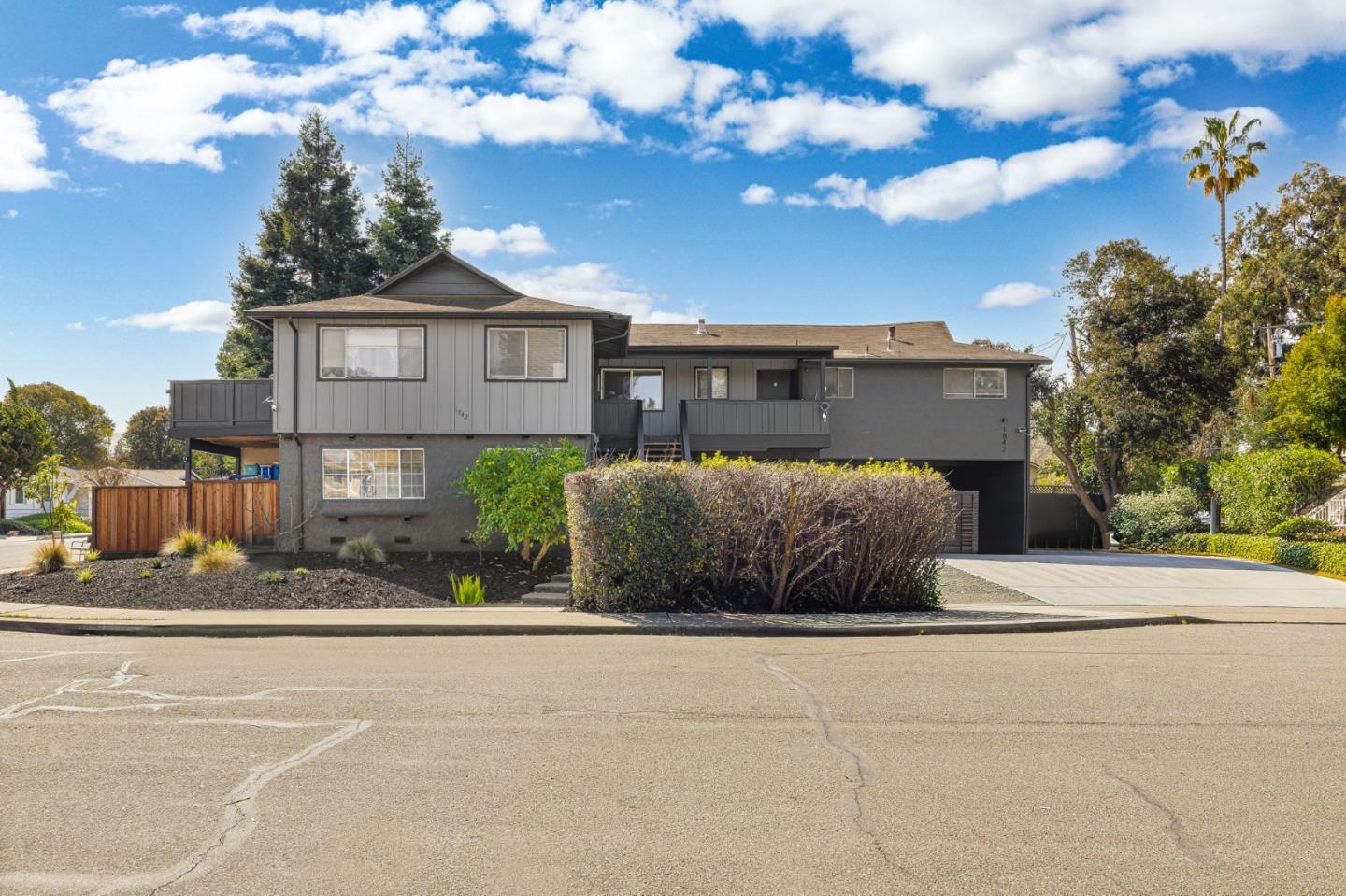 172 Permanente Way Mountain View, CA 94041 - Photo 1 of 5 a front view of a house with a yard