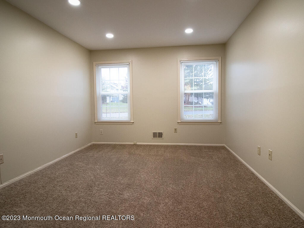459 Magnolia Court Howell, NJ 07731 - Photo 15 of 22 an empty room with a window