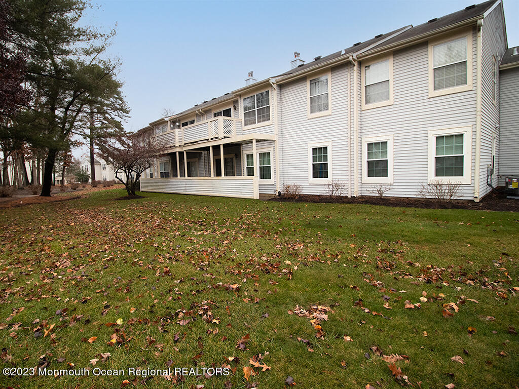 459 Magnolia Court Howell, NJ 07731 - Photo 18 of 22 a front view of a house with a yard