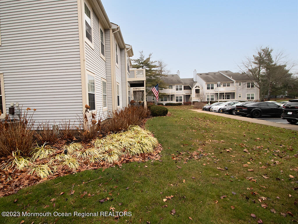 459 Magnolia Court Howell, NJ 07731 - Photo 2 of 22 a view of a street with a building in the background