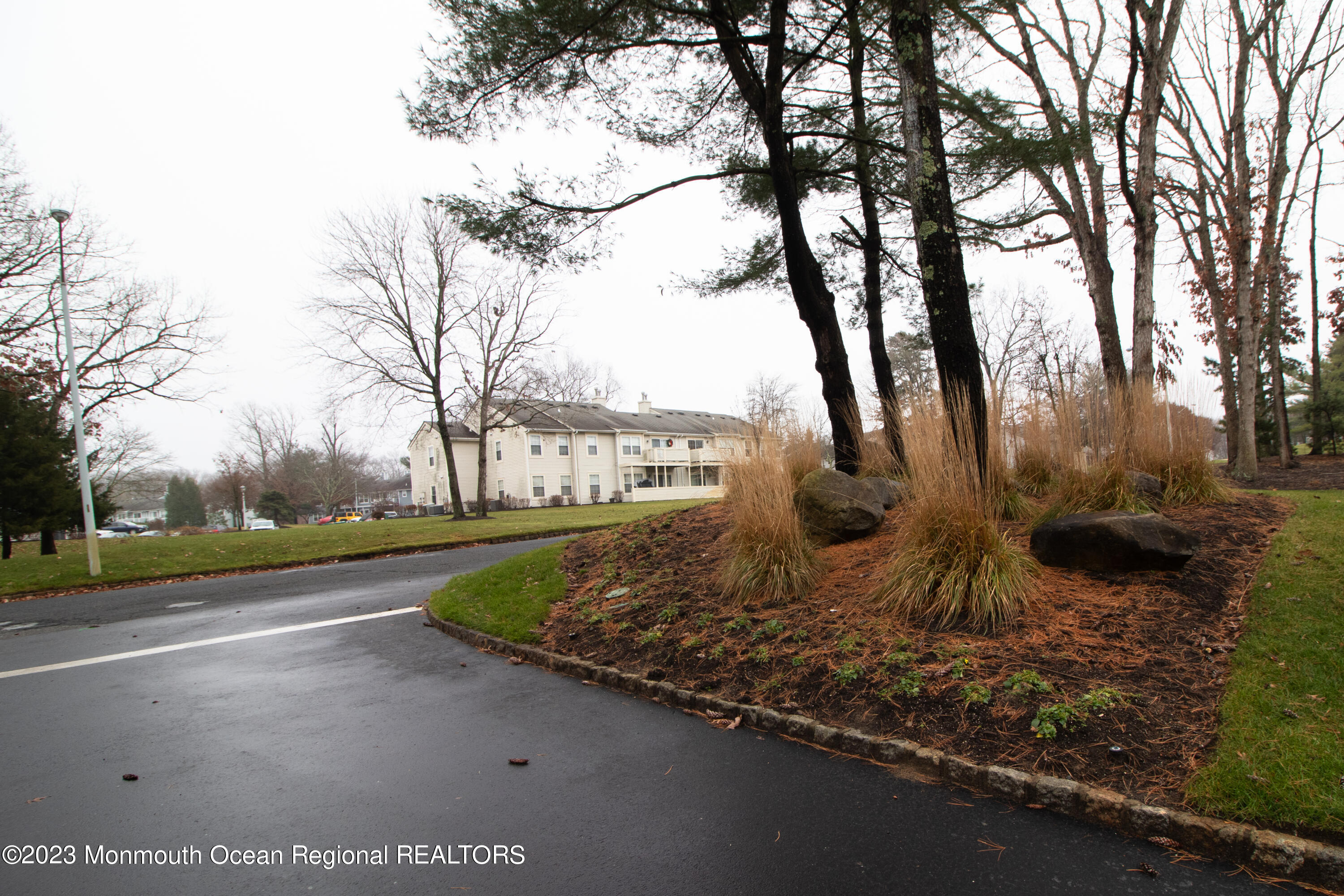 459 Magnolia Court Howell, NJ 07731 - Photo 21 of 22 a view of a street with a large trees