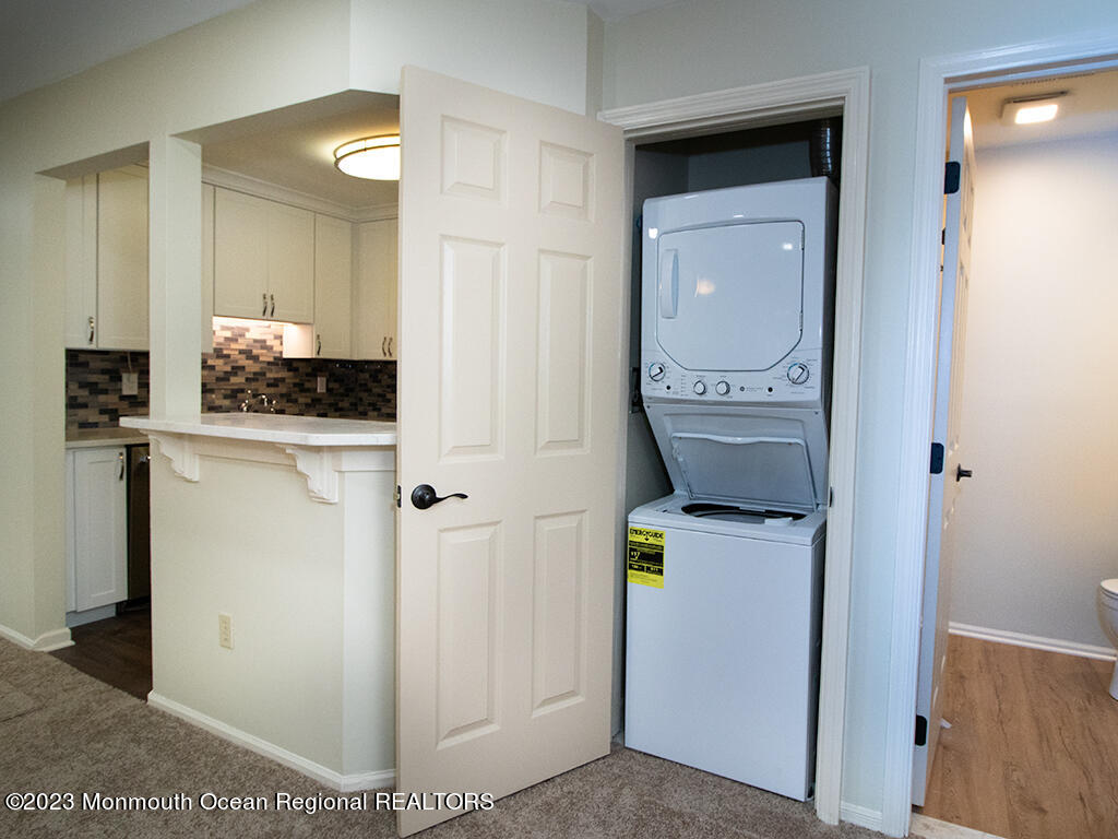 459 Magnolia Court Howell, NJ 07731 - Photo 10 of 22 a room with a washer and dryer