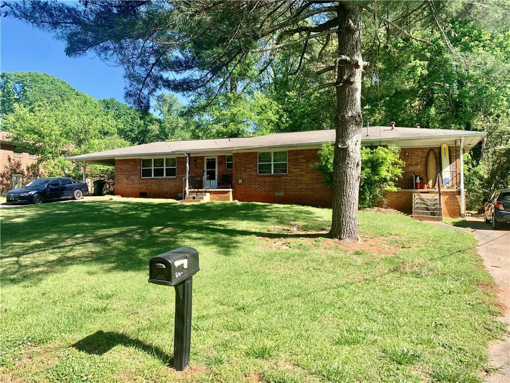 1500 Janmar Drive Decatur, GA 30032 - Photo 1 of 1 a front view of house with yard and green space