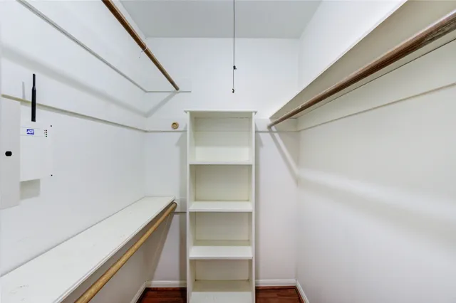a view of an empty walk in closet