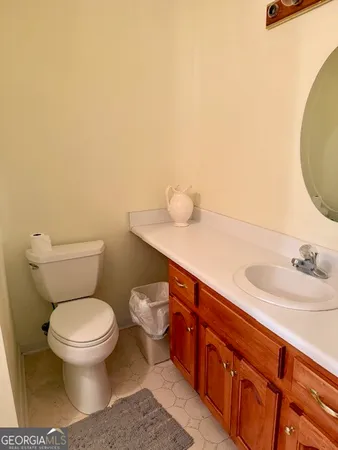 a bathroom with a sink and a toilet