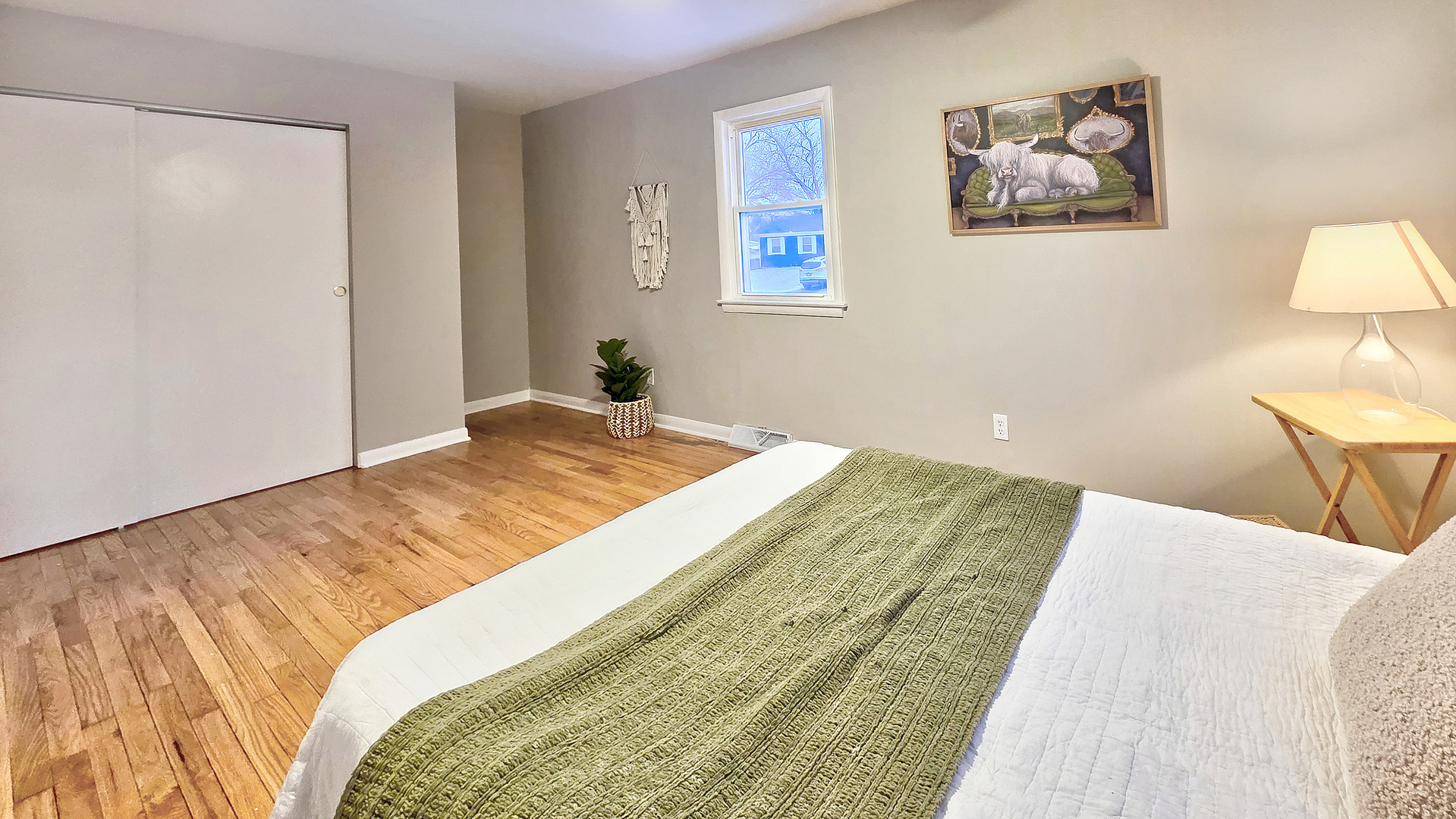 1509 Pine Street McHenry, IL 60051 - Photo 14 of 17 a bedroom with a bed and painting on the wall