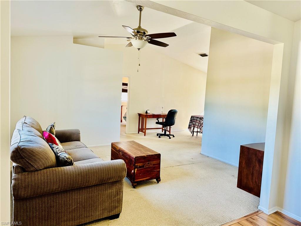 9108 Caloosa Road Fort Myers, FL 33967 - Photo 3 of 19 a living room with furniture