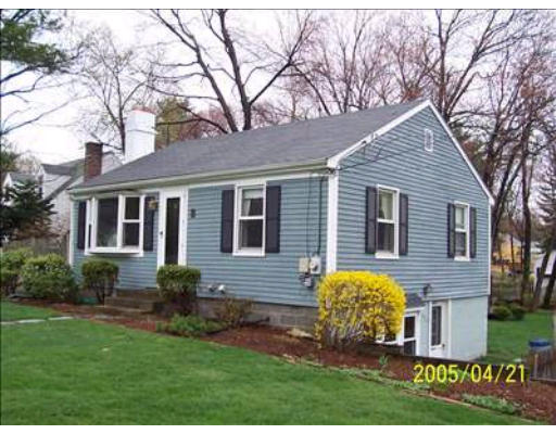 a front view of house with yard outdoor seating and yard