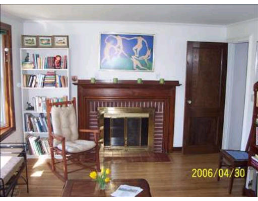 5 Audrea Road Framingham, MA 01701 - Photo 4 of 6 a living room with furniture and a fireplace