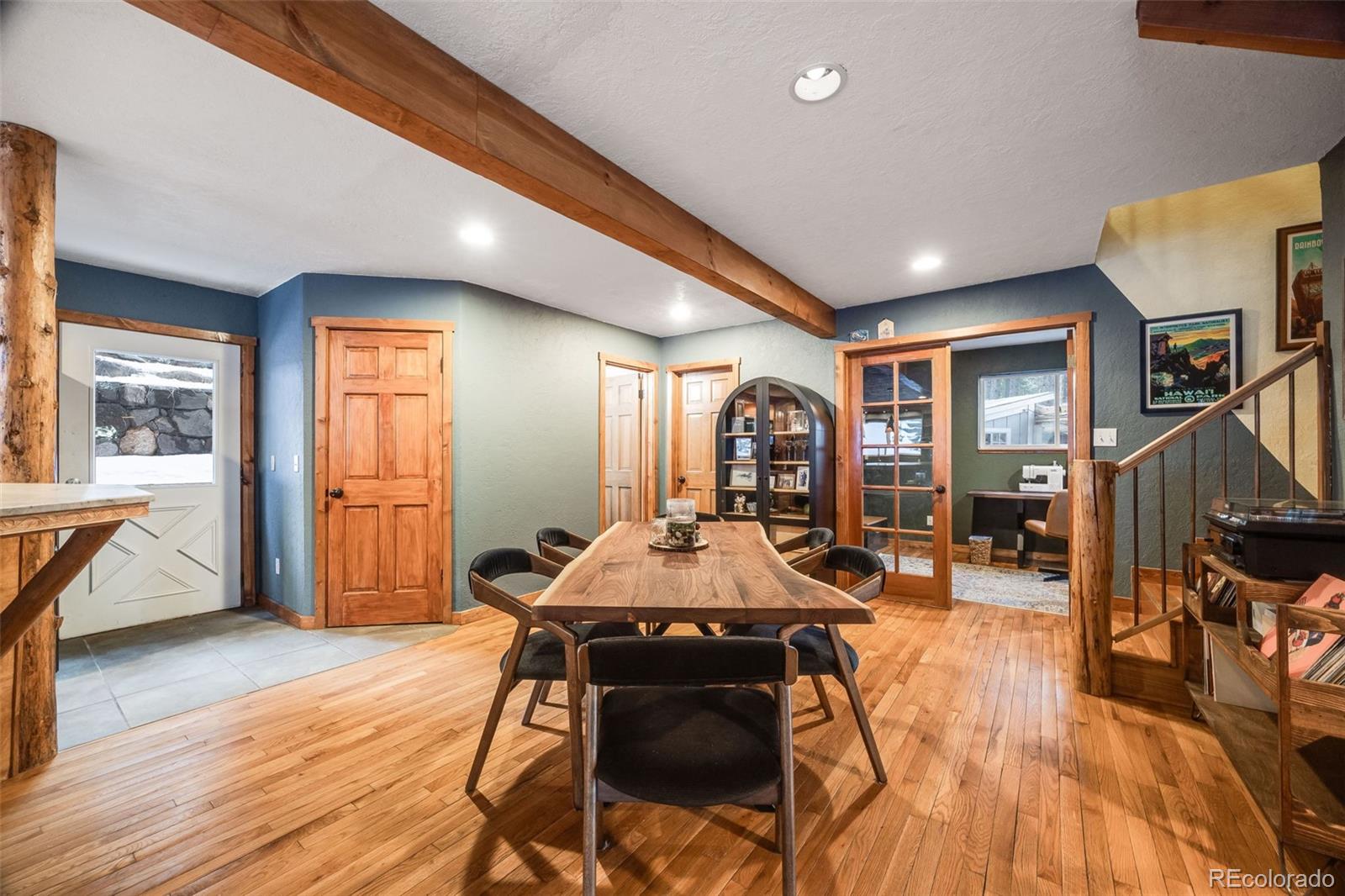 46 Apache Road Evergreen, CO 80439 - Photo 11 of 46 a outdoor space with furniture and wooden floor