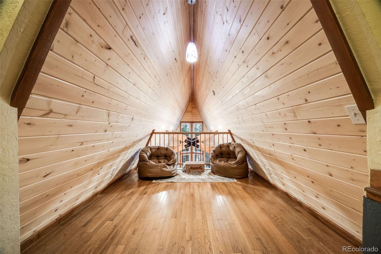 46 Apache Road Evergreen, CO 80439 - Photo 24 of 46 a view of wooden floor with a sink and wooden floor