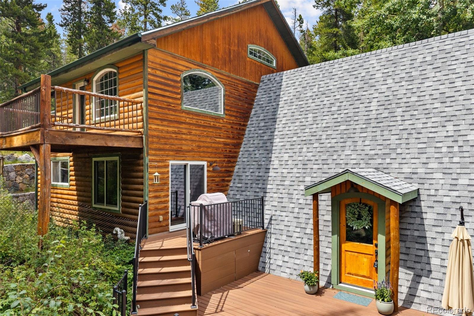 46 Apache Road Evergreen, CO 80439 - Photo 3 of 46 a view of a house with a balcony