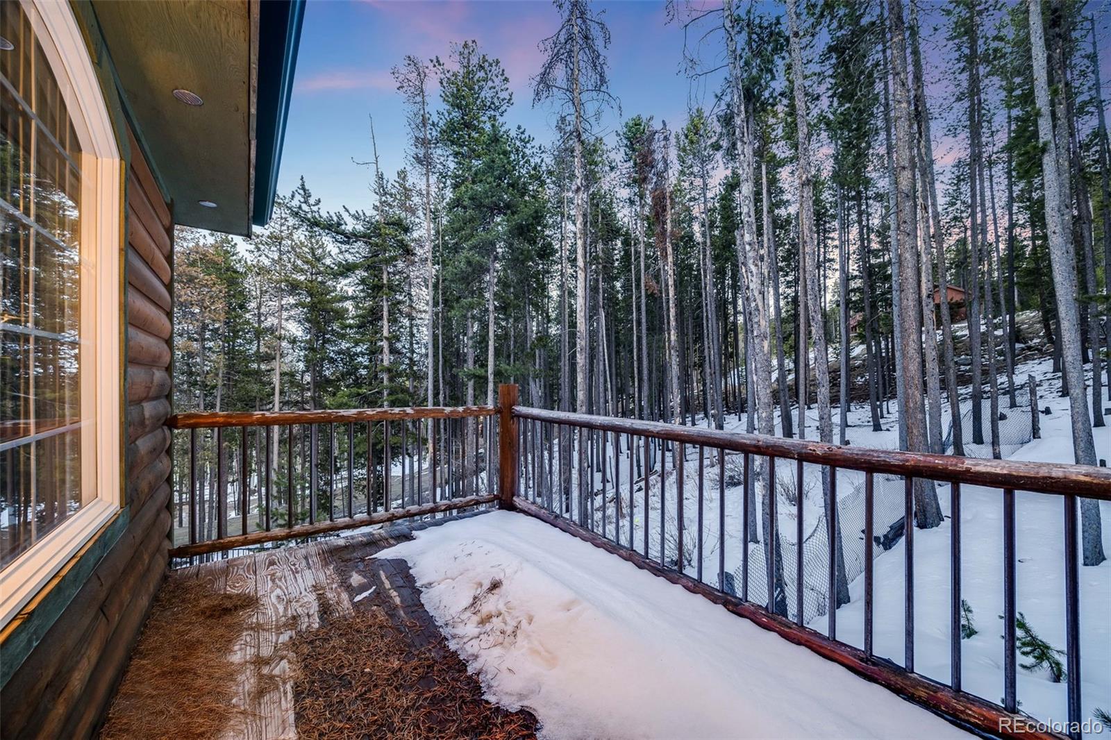 46 Apache Road Evergreen, CO 80439 - Photo 34 of 46 a view of a balcony with wooden floor