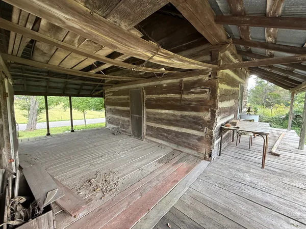 a view of a room with wooden walls