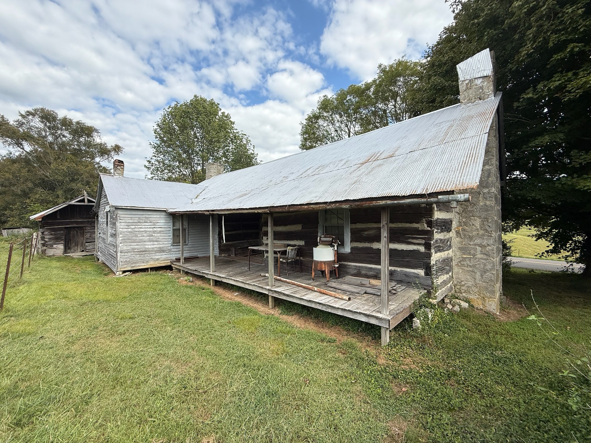 0 County House Road Tompkinsville, KY 42167 - Photo 25 of 37 a view of a house with a yard porch and sitting area